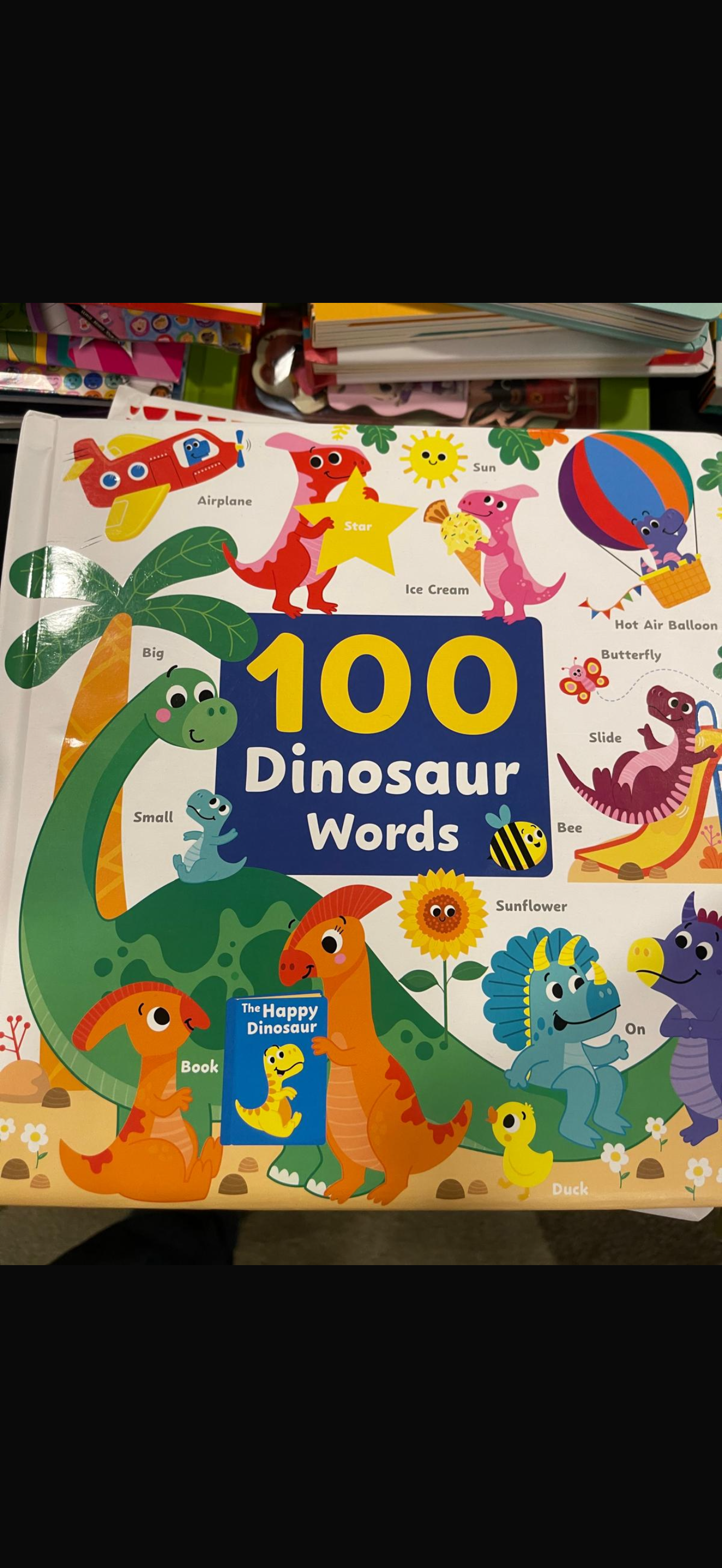100 first dinosaur words padded book